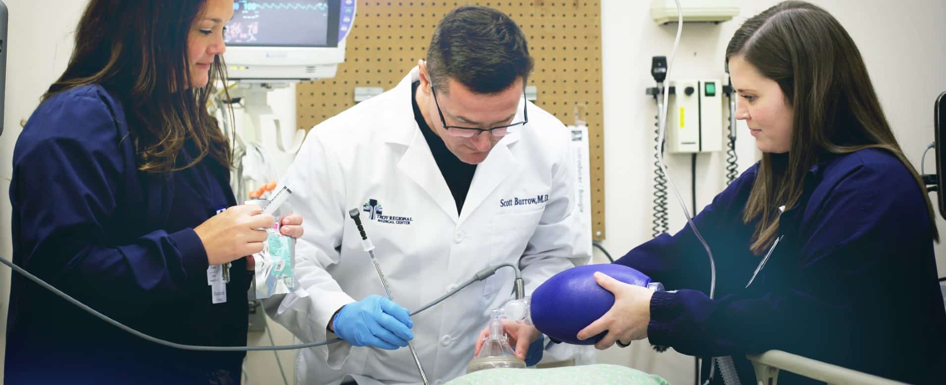 a group of people looking at a woman