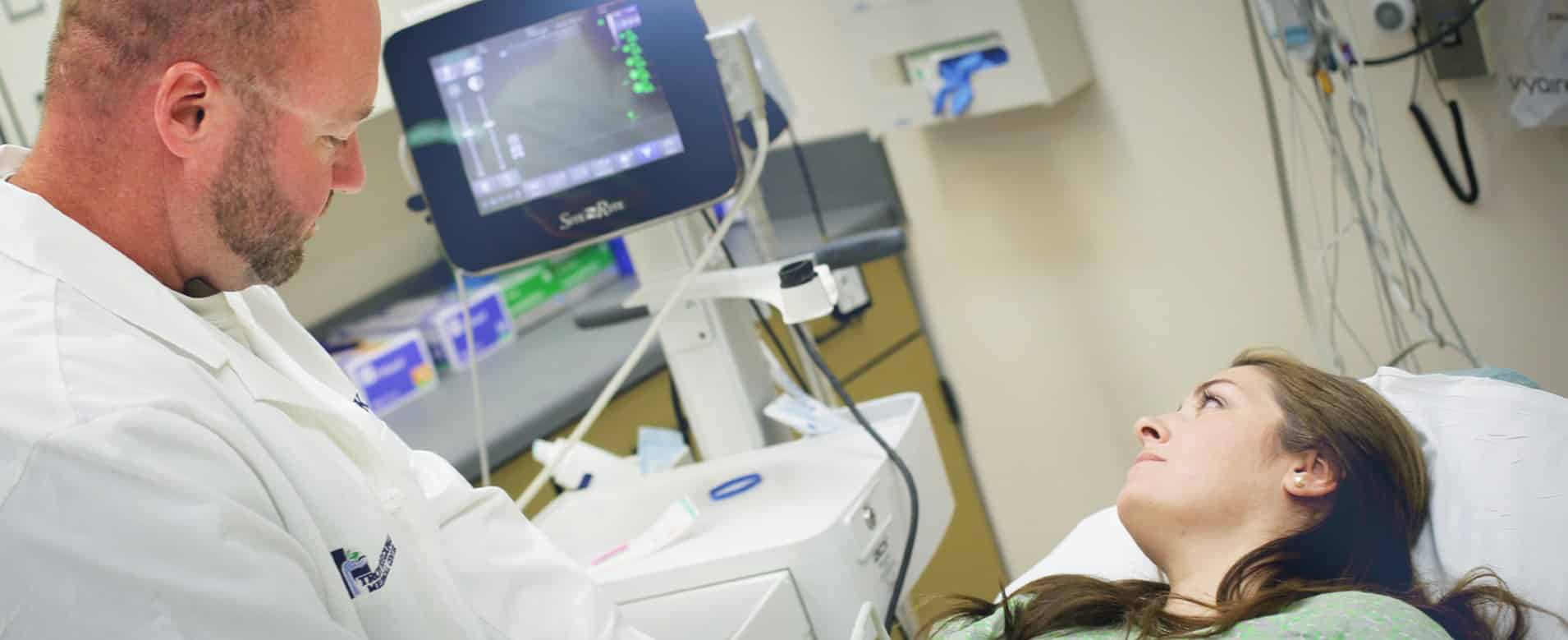 a man taking a selfie in a room