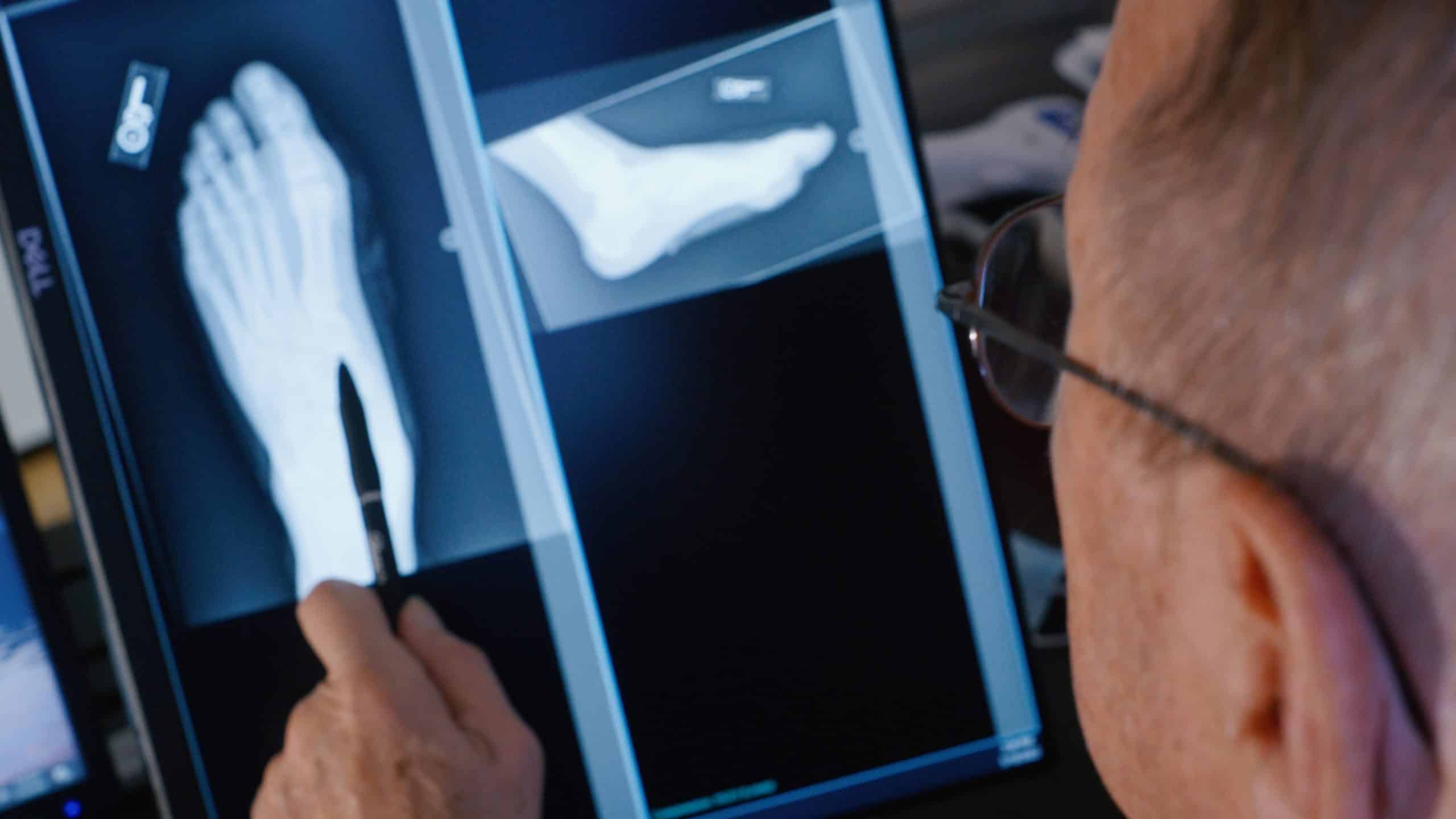 a man using a laptop computer a man using a laptop computer