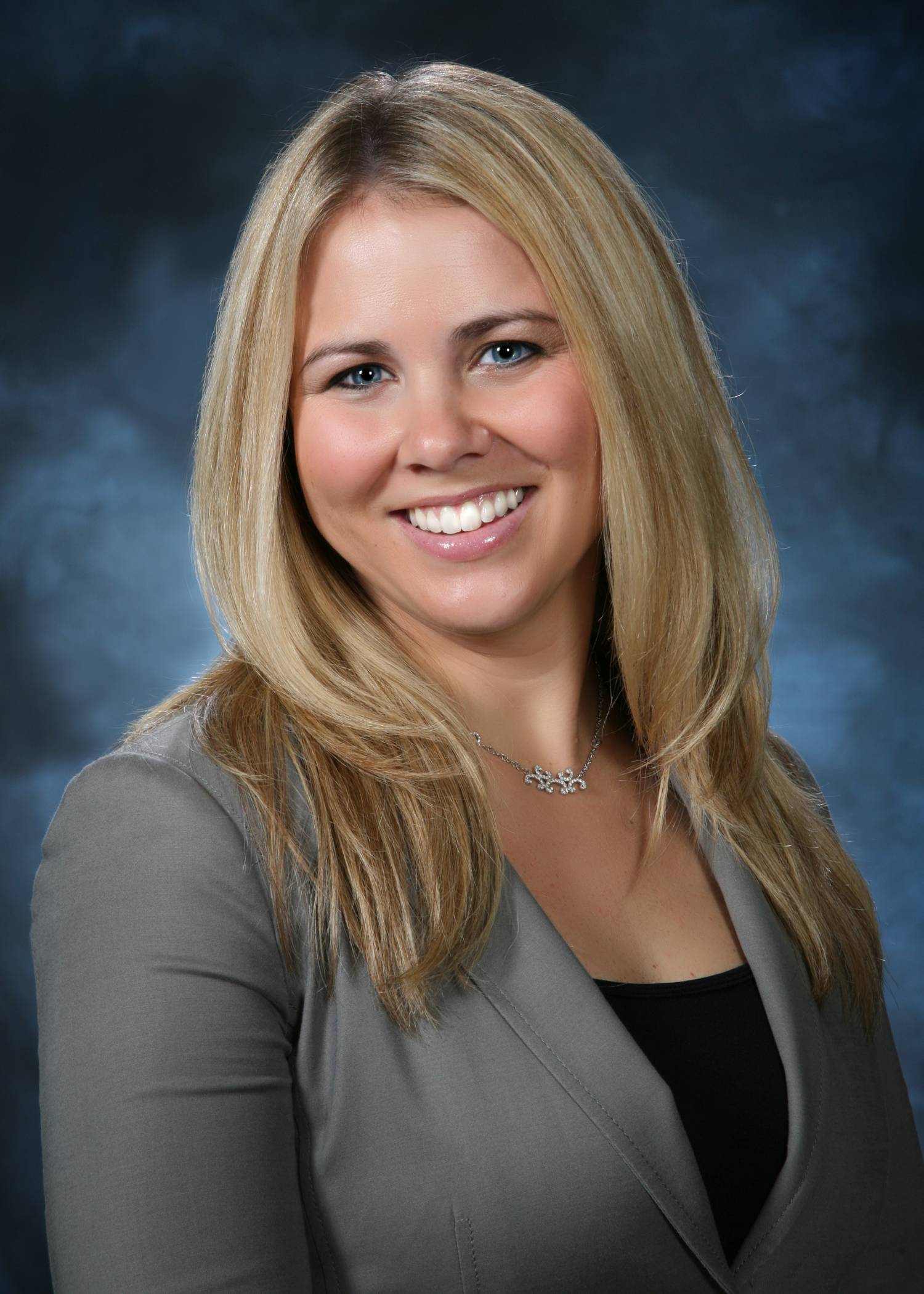 a woman smiling for the camera