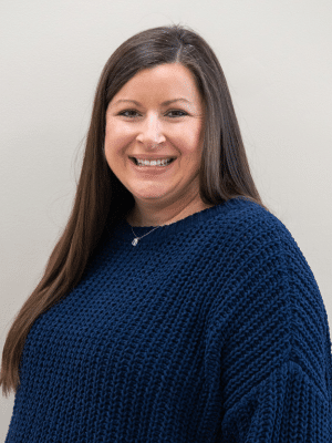 a woman smiling for the camera