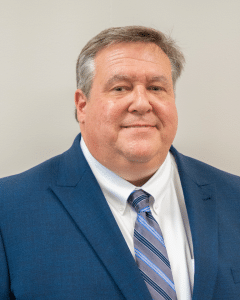 a man wearing a suit and tie a man wearing a suit and tie