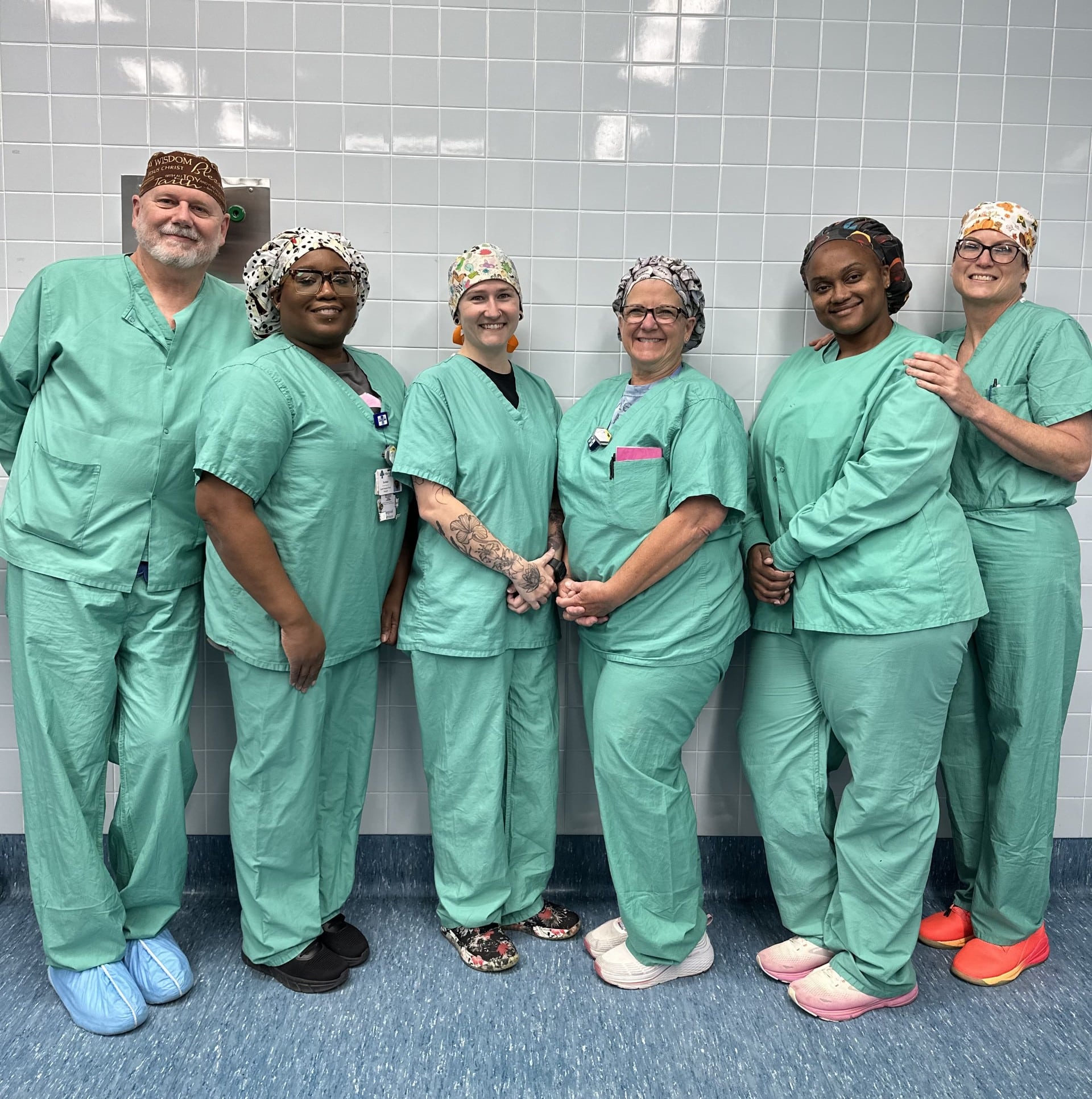 a group of people posing for a photo